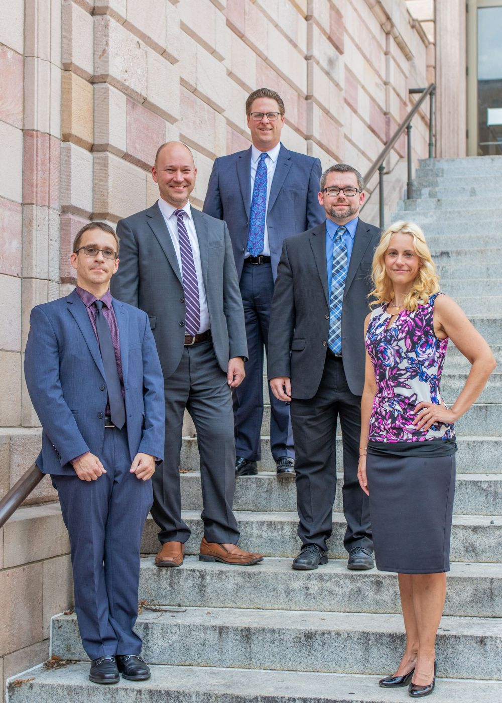 Trinity Law Attorneys on courthouse steps.